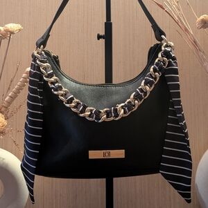 Elegant Black Handbag with Gold Chain Scarf